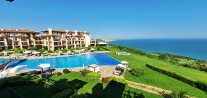 an aerial view of a resort with a swimming pool at Kaliakria Sea View Apartments in Topola
