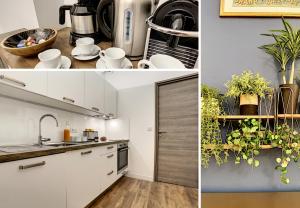 a kitchen with white cabinets and plants and a sink at Coeur Vieux Nice - Place Rossetti in Nice +12 photos