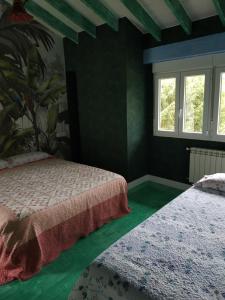 Katil atau katil-katil dalam bilik di JARDINES DE BALMORI