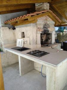 Nhà bếp/bếp nhỏ tại Vila Flora