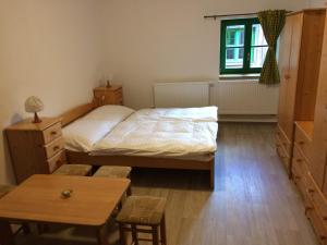 Postel nebo postele na pokoji v ubytování Chata Rozhlas