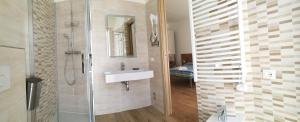 a bathroom with a shower and a sink and a shower at B&B Reale - Ortona in Ortona +36 photos