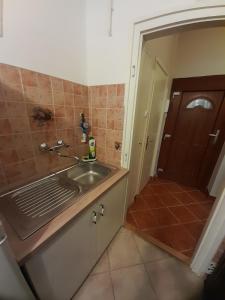 Kúpeľňa v ubytovaní Zöld Sziget Apartmanlakás