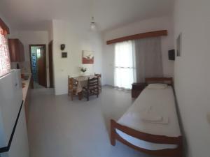 Postel nebo postele na pokoji v ubytování Zikas apartments
