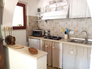 Φωτογραφία από το άλμπουμ του Case Davanti al Mare con Ampio Giardino e Parcheggio Gratuito σε Σάντα Κατερίνα