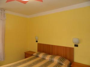 Postel nebo postele na pokoji v ubytování Roxena house