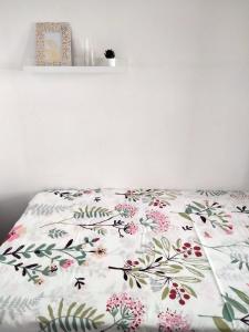A bed or beds in a room at EL RINCON DE LUZ