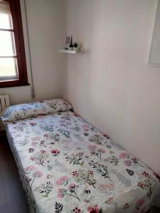 A bed or beds in a room at EL RINCON DE LUZ