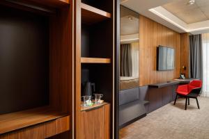 Posezení v ubytování Qosmo Brasov Hotel