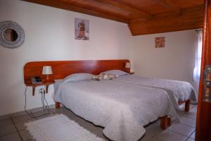 Un pat sau paturi într-o cameră la Casas Tipicas Candelaria Tabua