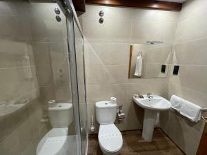 O baie la La Era de Lario habitación con Jacuzzi