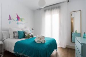 Postel nebo postele na pokoji v ubytování Pop Art, Un aroma a San Julián en Enladrillada