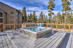 a hot tub on the deck of a house at Walk to Main St and Chairlift Breckenridge Condo! in Breckenridge