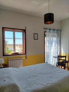 Postel nebo postele na pokoji v ubytování Hotel Jardim Oudinot "MyWay Kite&Surf"