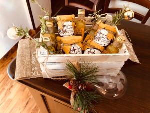 a crate filled with cheese on top of a table at Agriturismo DonnoMarco in Simeri
