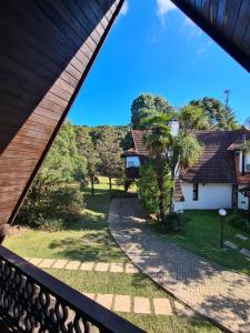 a view from the balcony of a house at Chalé do Bosque in Gramado