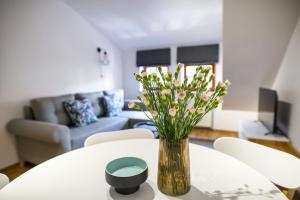 Posedenie v ubytovaní Apartamenty Centrum Biskupiec