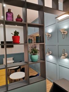 Kuchyň nebo kuchyňský kout v ubytování 3 Rooms Hotel