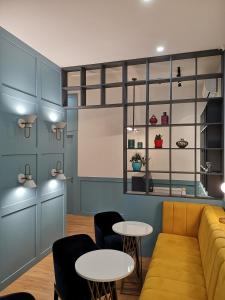 Posezení v ubytování 3 Rooms Hotel