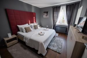 Postel nebo postele na pokoji v ubytování Villa Xaxat