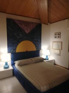 Posteľ alebo postele v izbe v ubytovaní Bellavista apartament