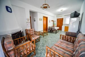 A television and/or entertainment centre at Apartman Porto Blue Lux