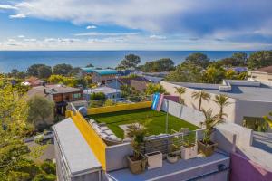an aerial view of a house with a tennis court at Beach Resort Home with Ocean Views Jacuzzi & Sauna! in San Diego