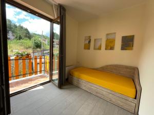 Postel nebo postele na pokoji v ubytování Arvo Residence Sila Lorica + 37 fotografií