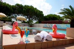 Bazén v ubytování Hotel Coppe Jesolo nebo v jeho okolí