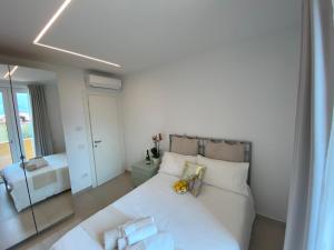 Posteľ alebo postele v izbe v ubytovaní B&B Am Gardasee blick