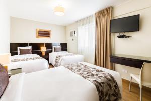 Postel nebo postele na pokoji v ubytování Hotel El Tambo 2