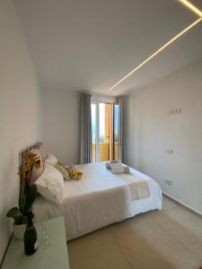 Posteľ alebo postele v izbe v ubytovaní B&B Am Gardasee blick