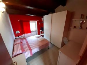 Ένα ή περισσότερα κρεβάτια σε δωμάτιο στο Casale Angela
