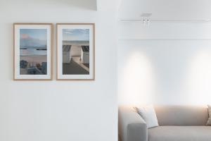 Posezení v ubytování Een designappartement met zijdelings zicht op zee