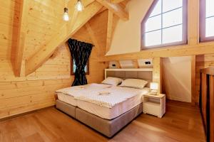 Posteľ alebo postele v izbe v ubytovaní Wood Fairy