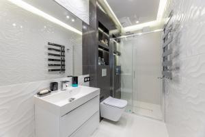 Kúpeľňa v ubytovaní Leo Apartament Delux + 37 fotografií