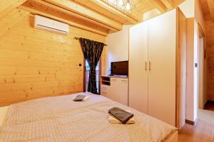 Posteľ alebo postele v izbe v ubytovaní Wood Fairy