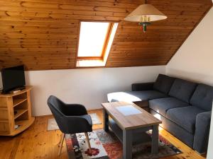 Posezení v ubytování Pacsirta Apartman