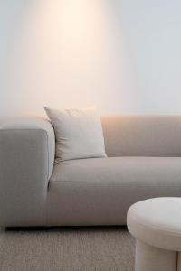 Posezení v ubytování Een designappartement met zijdelings zicht op zee