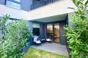 Vonkajšia záhrada v ubytovaní Apartamenty Portova Q4Apartments