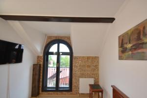 TV a/nebo společenská místnost v ubytování Gala - Guesthouse
