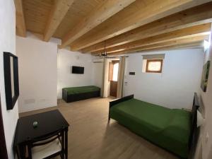 Voodi või voodid majutusasutuse Decadracma rooms toas