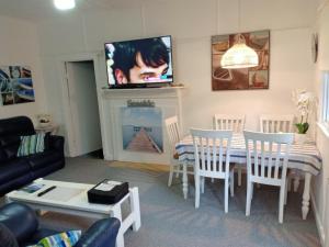 A television and/or entertainment center at The Boathouse a 3 Bedroom House