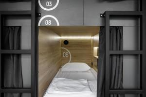 a room with two bunk beds in a room at Luna in Vladivostok
