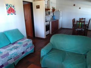 Una cama o camas en una habitación de Colibríes en Las Moreras