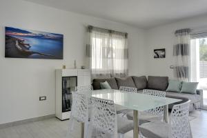 Posedenie v ubytovaní Villa Residence Oli A