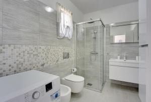 Kúpeľňa v ubytovaní Villa Residence Oli A