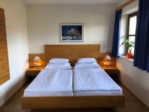 Łóżko lub łóżka w pokoju w obiekcie Appartement Schwab Ski in & Out