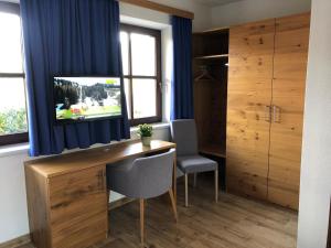 Telewizja i/lub zestaw kina domowego w obiekcie Appartement Schwab Ski in & Out