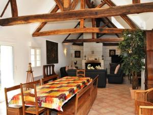 a room with a bed and a living room at Gîte Azay-sur-Cher, 6 pièces, 11 personnes - FR-1-381-359 in Azay-sur-Cher